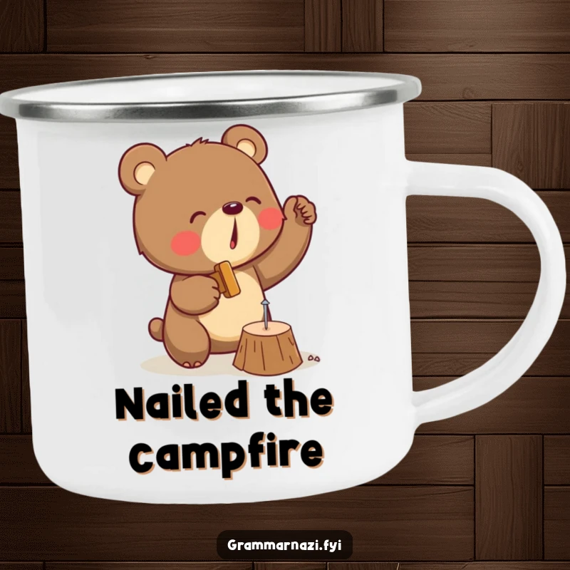 Funny camping mug displaying a determined bear hammering a tiny nail into wood, ready for any outdoor project.