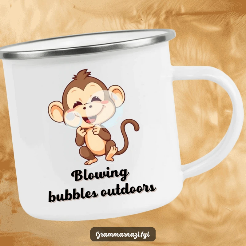 Funny camping mug displaying a mischievous monkey blowing a large bubble with a playful grin.