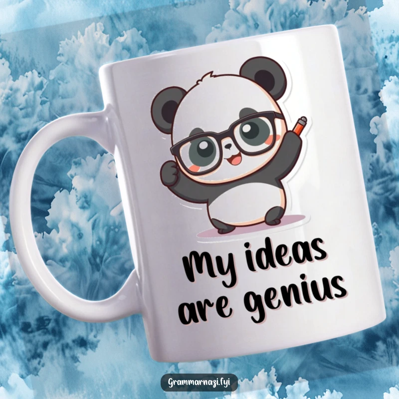 Funny panda wearing glasses holding a red pen aloft, looking smart on a coffee mug, ideal for book lovers and teachers.