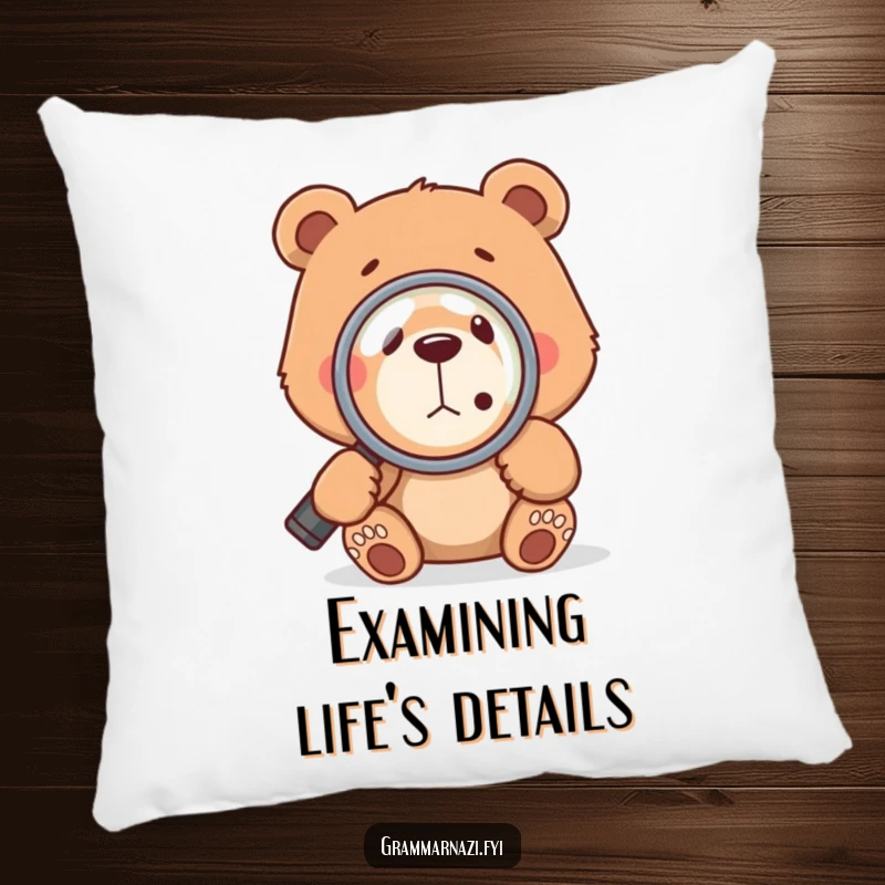 Soft and funny bear pillow featuring a magnifying glass inspecting a comma, adding a touch of humor and grammar love to any room.