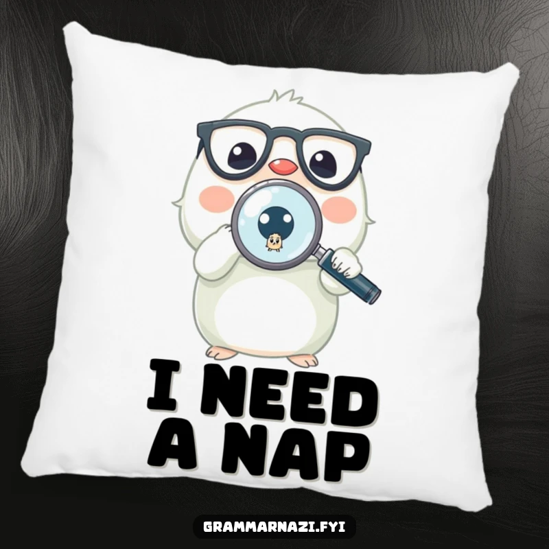 Funny pillow with a small, bespectacled creature intently looking at a tiny, out-of-place period through a magnifying glass.
