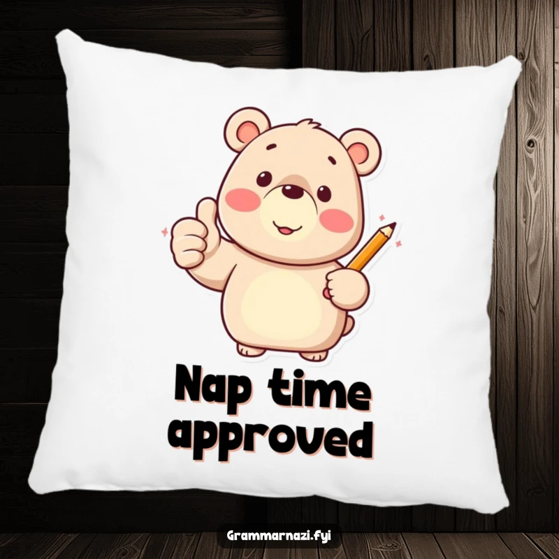 Funny pillow featuring a happy bear character giving a thumbs up while holding a pencil, offering comfort.