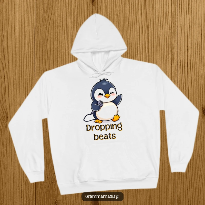 Funny hoodie with a tiny penguin winking and holding a miniature microphone. Music lover's gift.