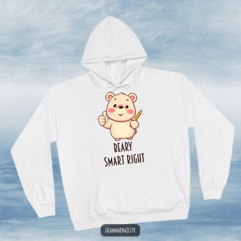 Funny hoodie featuring a happy bear character giving a thumbs up while holding a pencil, looking cheerful.