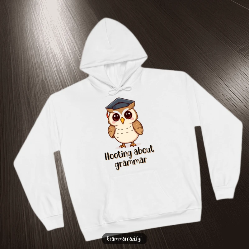 Funny hoodie with a curious owl wearing a tiny mortarboard hat, correcting punctuation, perfect for academics.