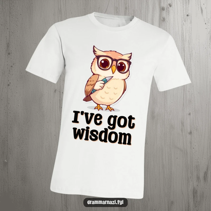 Funny Owl Spectacle Writer T-Shirt: A cute owl wearing spectacles taps a large pen, embodying focused, humorous energy.