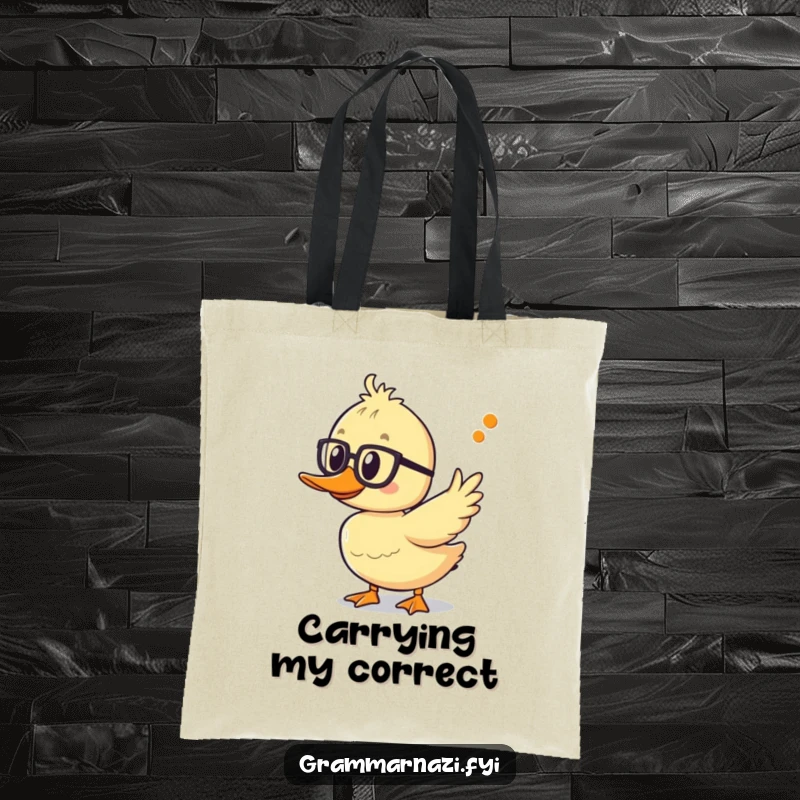 Funny duckling tote bag with spectacles, pointing at an apostrophe, perfect for carrying books and grammar essentials.