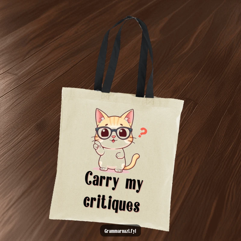 Funny tote bag featuring a smart cat wearing glasses, pointing precisely at a lone misplaced comma.
